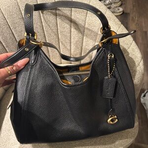 Coach Black Leather Shoulder Bag with Gold Accents